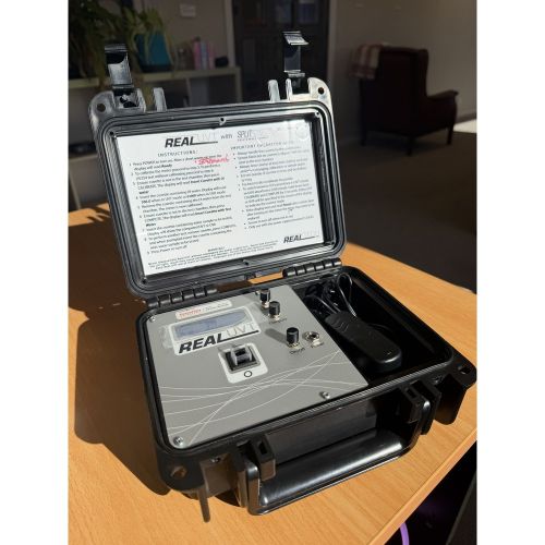 Second hand Real Tech Real UVT transmittance meter in its open carry case with power supply